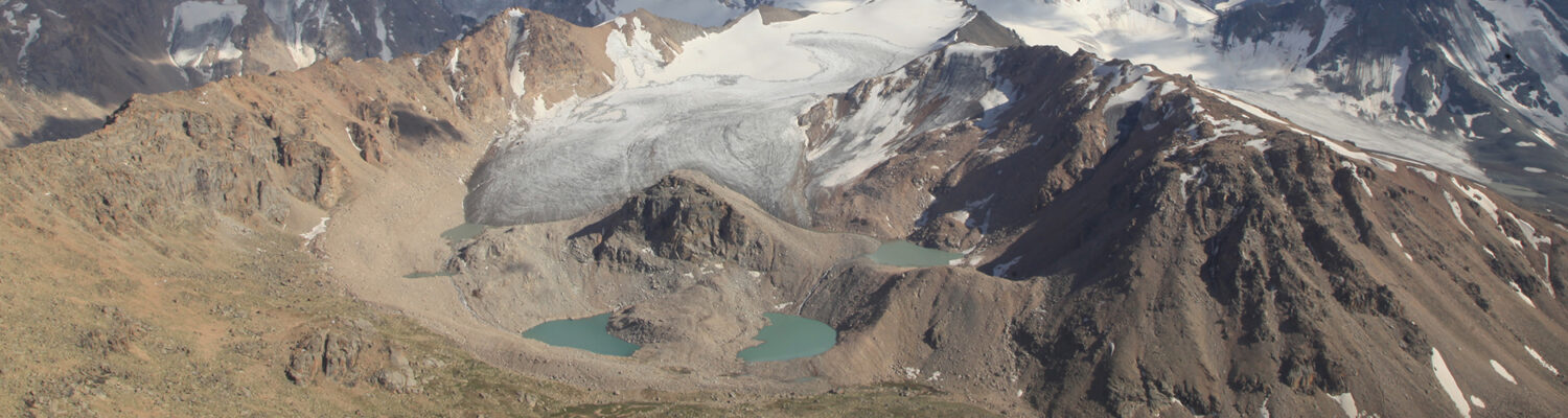 Cascading glacial lakes in the northwestern ridges of the Tien Shan, in Kazakhstan. Moraine-dammed glacial lakes are classed as formation centers of GLOFs and used as cartographic units in the interactive database. Photo by Yerzhan Kospakov