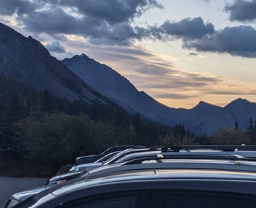 As participation in outdoor recreation continues to grow, it raises a number of questions about user crowding, conflict, and behavior change. Trailhead parking lots, like this one in Kananaskis Country, Alberta, often reach, and sometimes exceed, full capacity. Photo by K. Bellefeuille